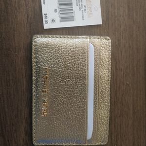 Gold Micheal Kors card holder